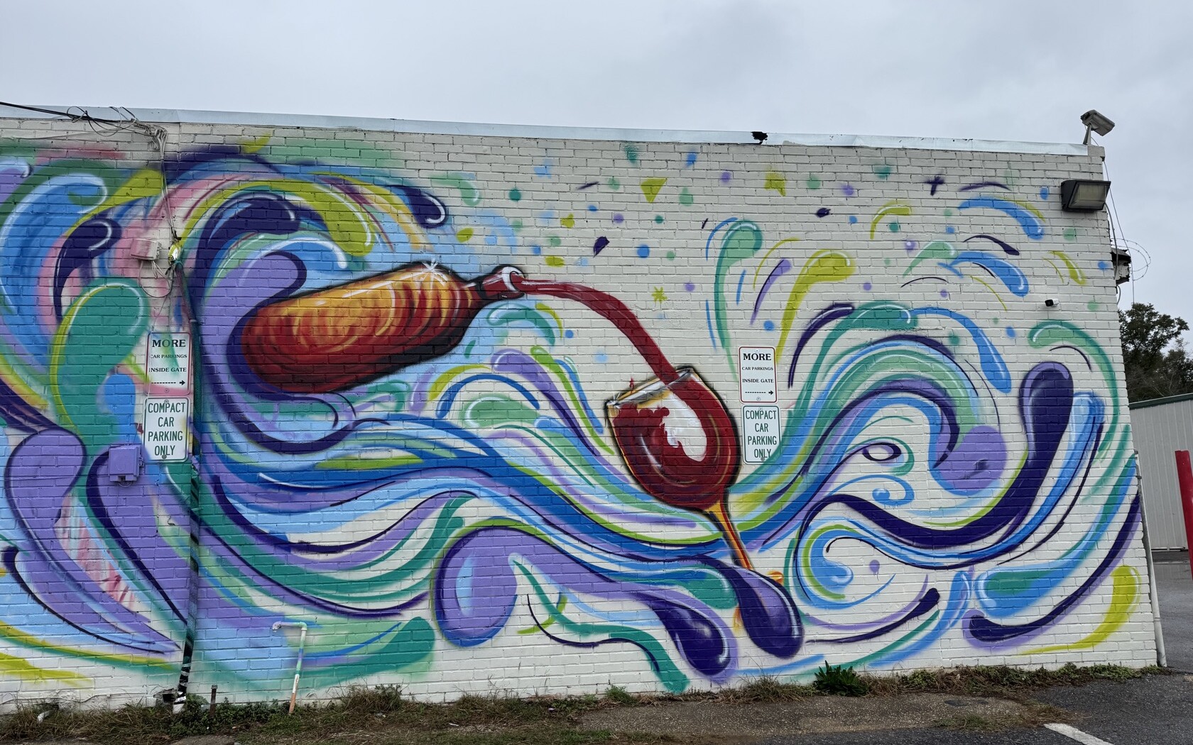 A hand-painted mural by Tina Cozart, seen in ordinary light