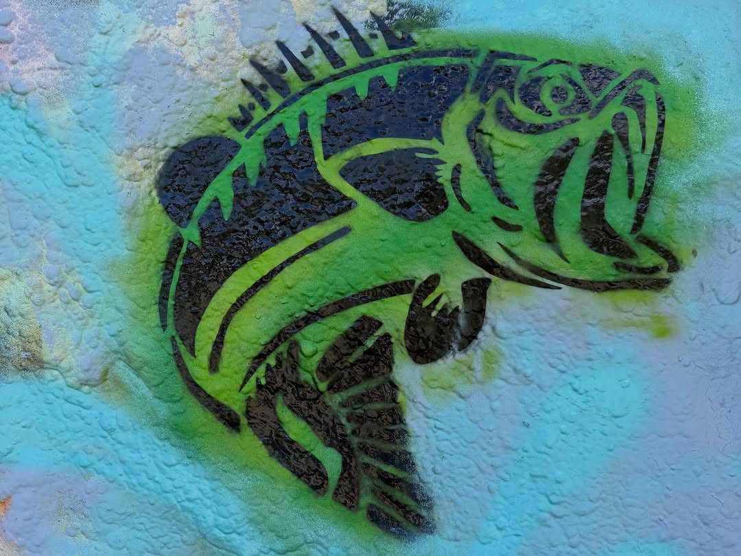 River Bass — a green-and-teal stencilled bass by Tina Cozart